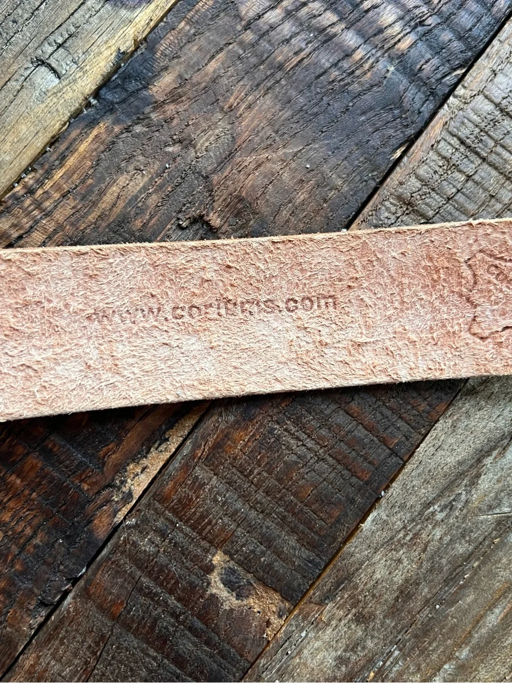 Two toned stamped leather belt with silver buckle